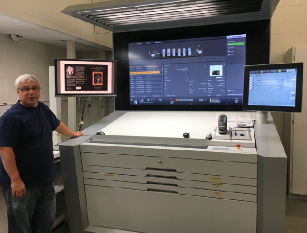 8 colour 72 inch Manroland , one of the largest offset presses in Canada 