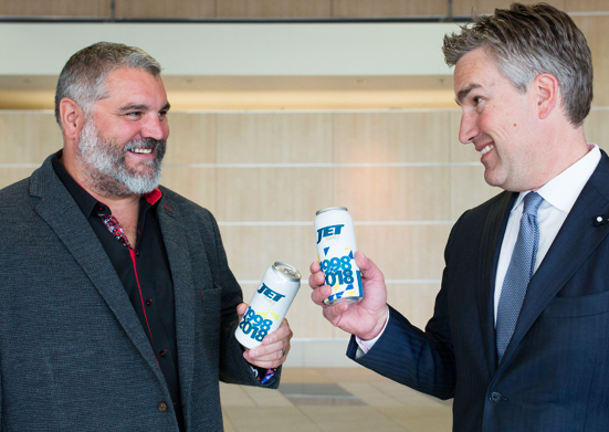 Rod Froment VP & COO and Darrell Friesen CEO with Mosaic printed cans 