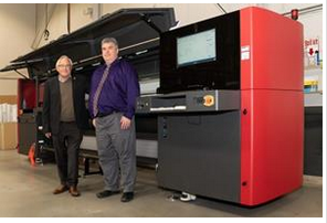 Conrad Desender (left), President , and Gregory Desender (right), Vice President of Intergraphics 