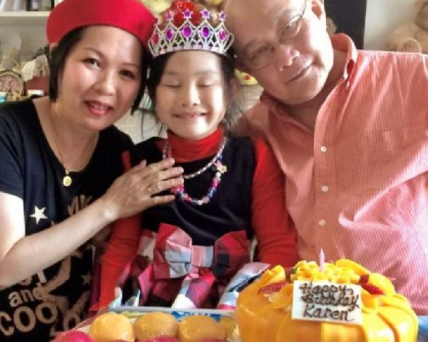 Mr. Soo Fat Moo of Great Little Box Company with wife and 9 year old daughter 