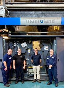 Luc Corbin, Manufacturing Efficiency Manager at Transcontinental Transmag (second right), together with Sylvain Laroche, Press Supervisor, Mario Belanger and Richard Roy, two of the press operators.