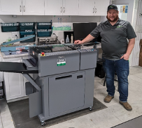 Shane VanEgmond, Owner of Sticker-it with Duplu DC-618 Slitter/Cutter Creaser