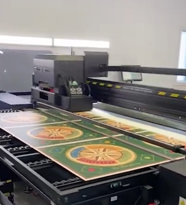 Wide formate printer printing board games. 