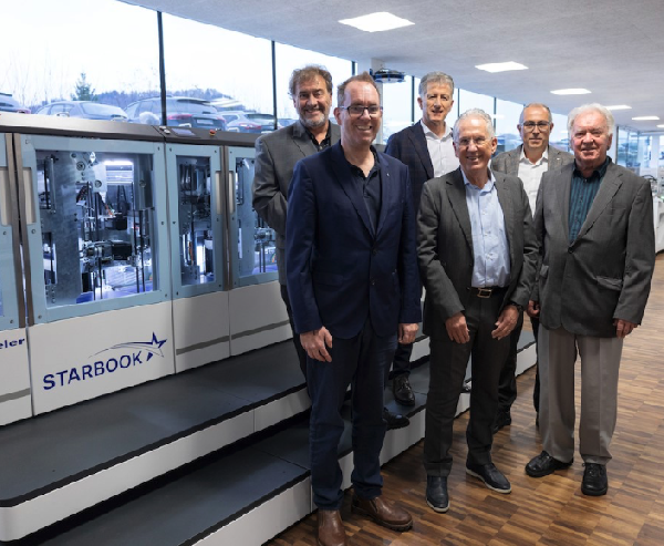 L to R : Stefan Hunkeler, president of Hunkeler ; Michel Hunkeler, Bruno M&uuml;ller, CEO of M&uuml;ller Martini; Rudolf M&uuml;ller, owner, M&uuml;ller-Martini ; Daniel Erni, CEO of Hunkeler; Franz Hunkeler.