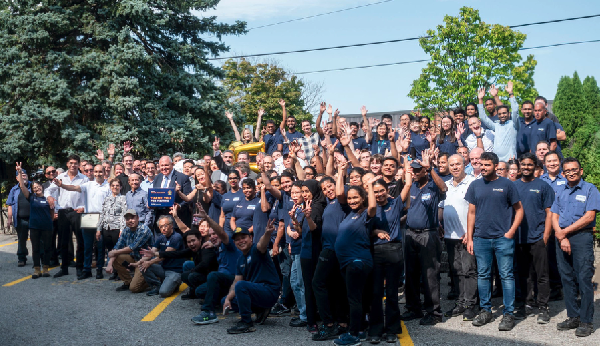 Staff celebrating 25 years of operation 