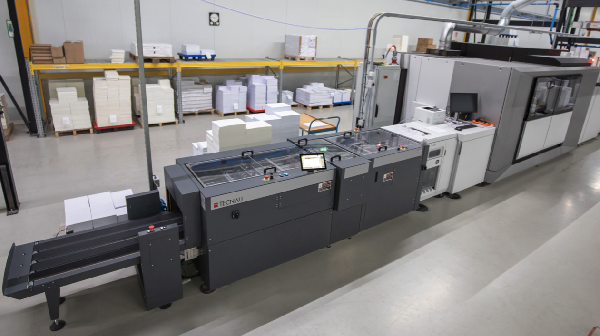 Tecnau Revolution 50 finisher series on a Ricoh Pro VC80000 Continuous Feed 